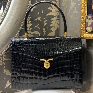 Black crocodile skin bag